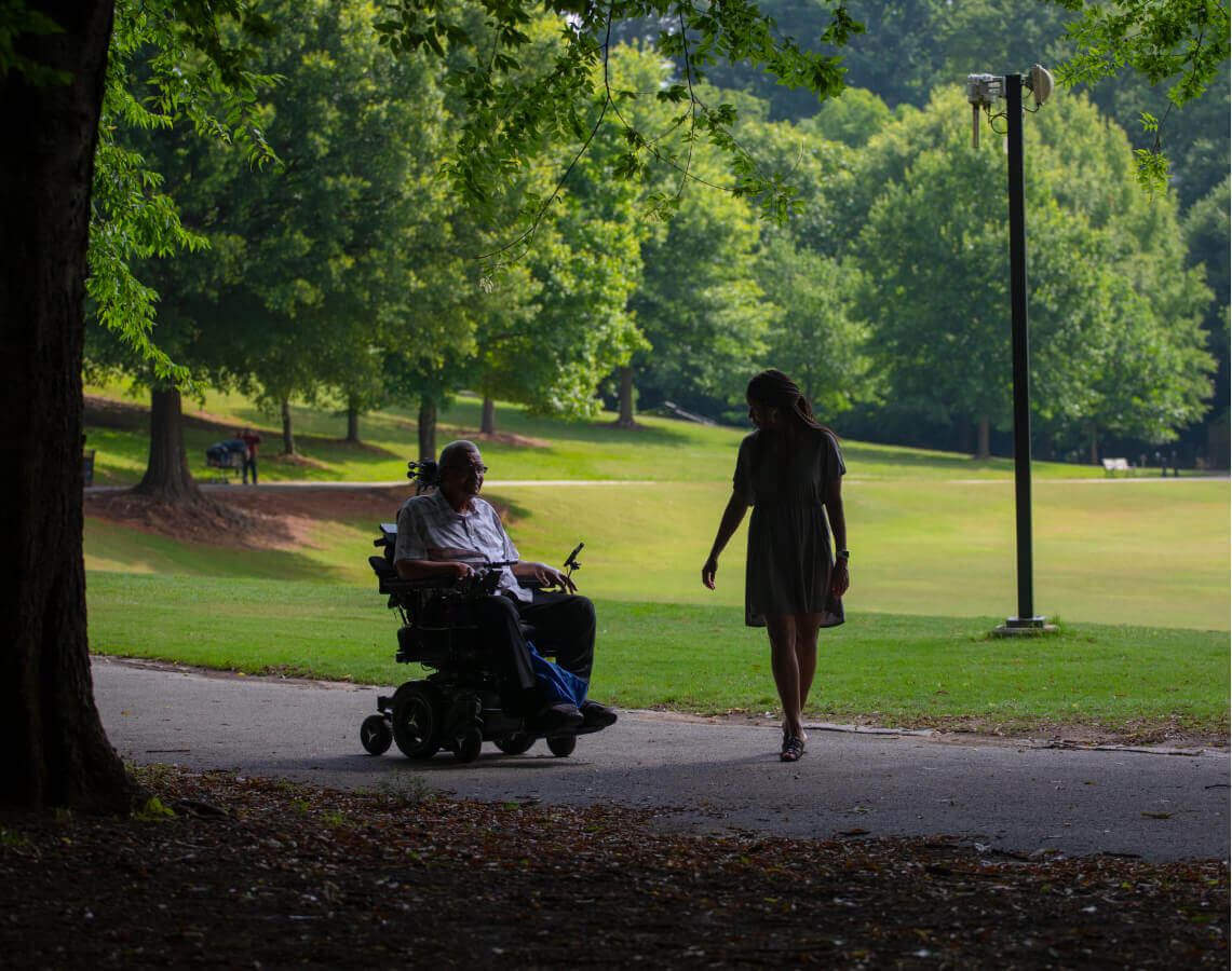 Jim and his wife in the park